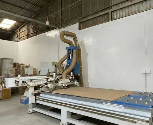 Máy CNC và hệ hút bụi tại nhà máy sản xuất AIC