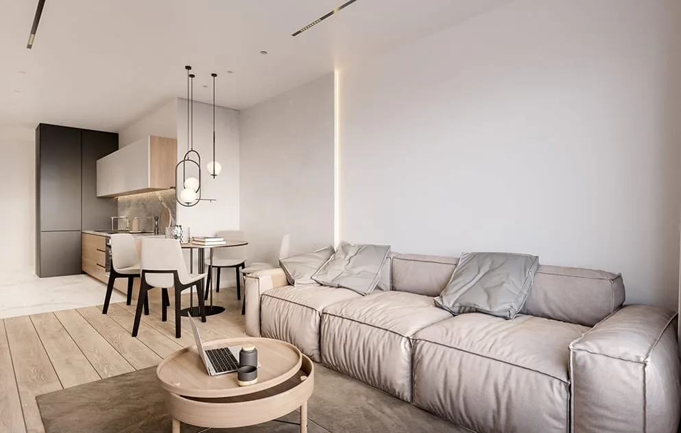 Phòng khách bố cục vuông vức với một bộ sofa hoàn chỉnh